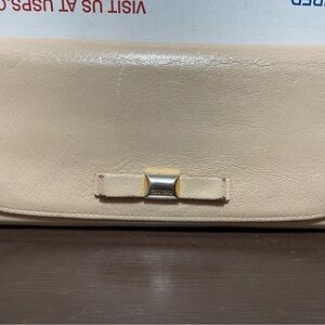 Miu Miu Beige Leather Clutch with Bow Accent